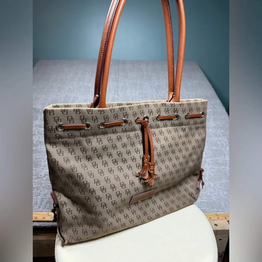 Dooney and Bourke Signature Canvas Tassel Tote